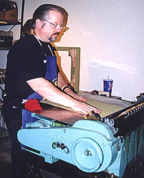 Gregg using the glue machine